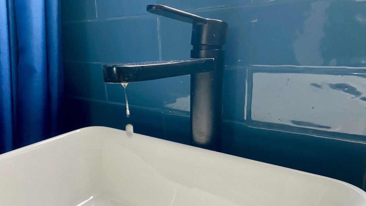 leaky tap blue bathroom